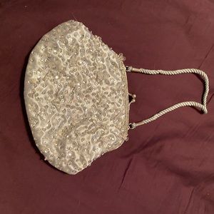 Silver clutch purse with sequins